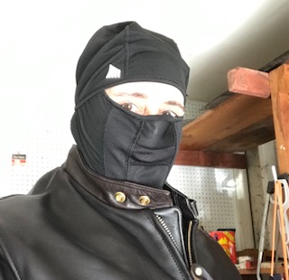 Author wearing black balaclava.