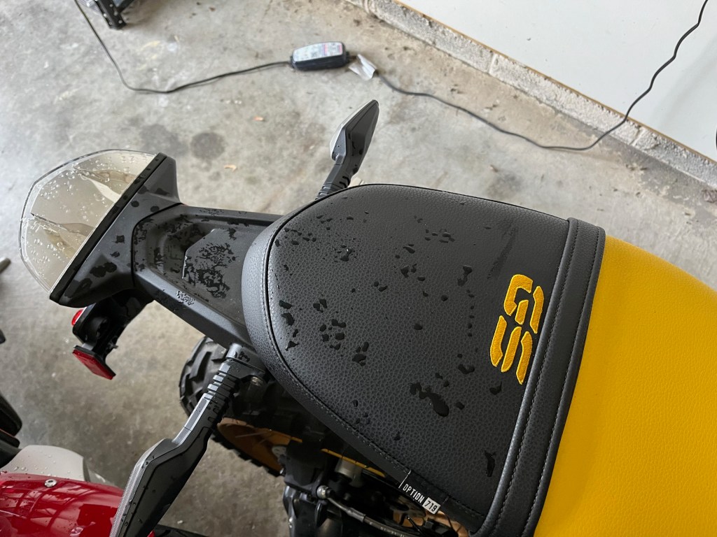 Raindrops on the pillion seat and taillight of the R Nine T.
