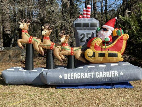 Santa's sleigh blow up with three reindeer on gray "Deercraft Carrier" platform.