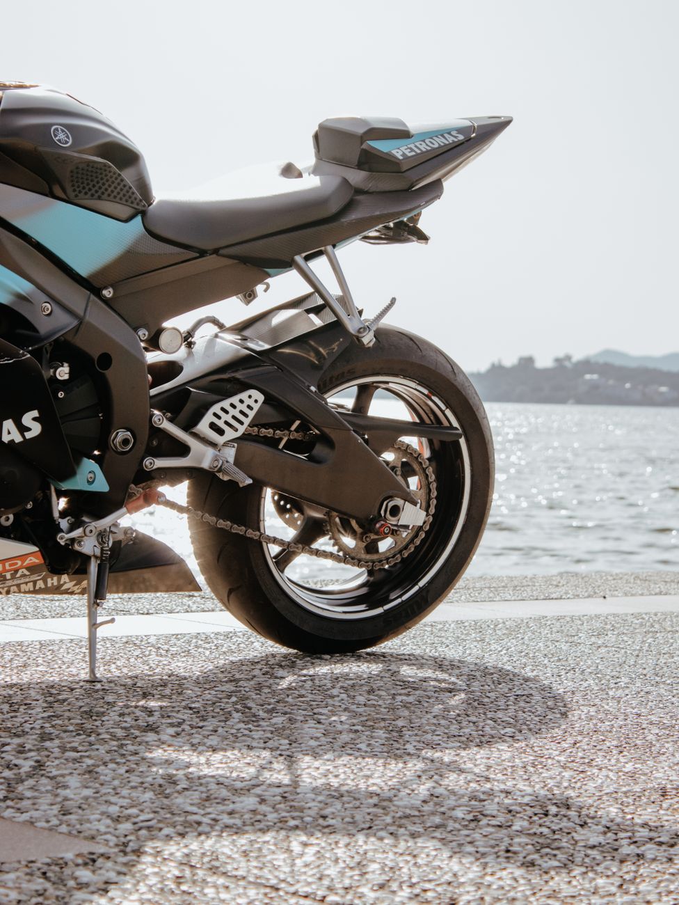 black motorcycle with kickstand down
